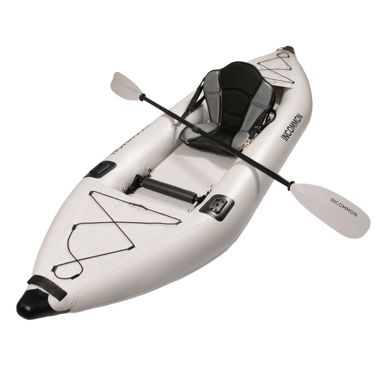 Incommon kayak and paddle from the side